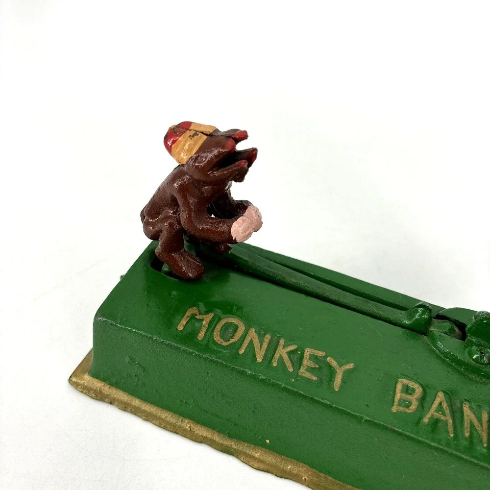ORGAN GRINDER MONKEY BANK Cast Iron Works Great‎